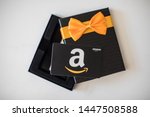 Small photo of Washington, D.C. / USA - July 10, 2019: A $50 Amazon gift card allows the recipient to purchase items from the Amazon.com website.