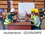 Small photo of Group of worker in the warehouse factory conduct toolbox talk daily meeting focus on safety priority and house keeping in the morning before start working