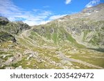 Hiking in Mölltaler Glacier area, high mountains, glacier, waterdams and cows on pastures