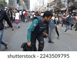 Small photo of Dhaka, Bangladesh - December 30, 2022: Bangladesh Jamaat-e-Islami clashed with the police during a mass rally demanding the caretaker government at Malibag in Dhaka.