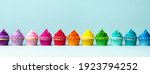 Row Of Colorful Cupcakes In...