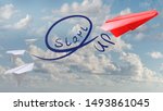 Small photo of Start-up business concept: red paper plane skyrocketing in sky symbolizing accelerating start-up business with text start up on a trail line. Abstract and creative compositing photo.