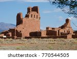 The Mission San Gregorio de Abo stands on a grassy field at the base of the Manzano Mountains in central New Mexico. It is part of the Salinas Pueblo Missions National Monument.