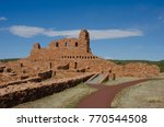 The Mission San Gregorio de Abo stands on a grassy field at the base of the Manzano Mountains in central New Mexico.  It is part of the Salinas Pueblo Missions National Monument.