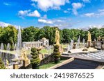 Small photo of St. Petersburg, Russia - August 23, 2023: Fountains of Peterhof. View of Grand Cascade from Grand Palace. Golden statues, Samson Fountain in Lower park of Petrodvorets