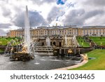 Small photo of St. Petersburg, Russia - August 23, 2023: Fountains of Peterhof. Golden statues of Grand Cascade and Samson Fountain at Peterhof Palace.
