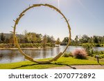 Small photo of New Orleans, LA - October 28, 2021: "The Sun" sculpture by Ugo Rondinone, located in the Sydney and Walda Besthoff Sculpture Garden at City Park.