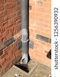 Small photo of Lead gutter water pipe from an English Georgian workhouse. Lead water pipe from the guttering of a Georgian workhouse in England.