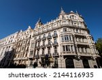 Small photo of Exterior view of historical buildings in Madrid, Spain, Europe. Mediterranean street characterized by elegance, discreet exclusivity, and total tranquillity in the classic Retiro neighborhood.