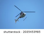 Small helicopter in flight....