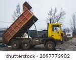 Small photo of Dump truck - Decommissioned industrial vehicle.