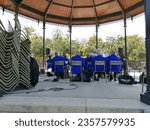 Small photo of paris, france - september 3 2023 : jazz band playing in the bandstand of the Luxembourg park.