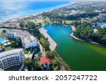 Small photo of Lake Titreyengel. A trembling lake. Sorgun. Side.The resort village of Titreyengol on the shores of a trembling lake in Turkey. There are many four and five star hotels around the lake. Drone shooting