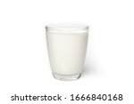 Milk In A Glass Isolated  On...