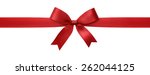 Red ribbon with bow isolated on ...