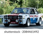 Small photo of Piacenza, Italy,2021,september, 25th Silver Flag historical car parading Fiat 131 Abarth