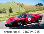 Small photo of Piacenza, Italy,2022,june Silver Flag historical car parading, Ford GT40