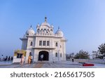 Small photo of Anandpur Sahib, Punjab, India - March 2022: Gurdwara Takht Sri Kesgarh Sahib in anandpur sahib, the birthplace of the khalsa sacred to the Sikh religion. White building architecture of sikhism.