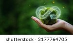 Small photo of businessman holding circular economy icon Circular economy concept for future business growth and environmental sustainability and reduce pollution for future business and environmental growth.
