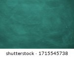 Small photo of Abstract texture of chalk rubbed out on green blackboard or chalkboard background. School education, dark wall backdrop or learning concept.