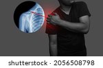 Small photo of Close up Shoulder and clavicle fracture pain in a man, Young man holding his shoulder in pain Shoulder inflammation symptoms medical healthcare concept.