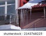 Icicles Under The Roof Of The...