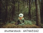 Young girl enjoy the forest view