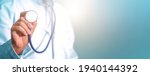 Small photo of Hand of doctor with a stethoscope. Stethoscope Doctor, Doctor in hospital. Healthcare and medicine concept. Outbreaking Coronavirus COVID-19. insinuate that it's time for a check up in clinic banner.