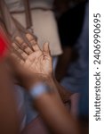 Small photo of Hands of a religious person in prayer. Concept of religiosity.