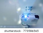 High quality Projector(4K) at the ceiling in conference room with copy space.Projector at business conference or lecture.For offices and training facilities. Irradiation.