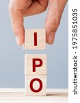 Small photo of IPO (Initial Public Offering) word with wooden cube block, shares of a private corporation to the public in a new stock issuance. Stock, Fund, Investors and Investment concept