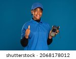 black woman holding a pos device