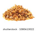 Pile of fried gold onion or shallots for garnishing isolated on white background.