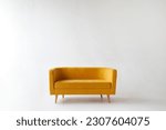 Soft empty yellow sofa stands...