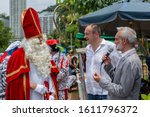 Small photo of Rio de Janeiro, Brazil - December 1, 2019: Vice consul of The Netherlands welcomes Sinterklaas and his assistants on the city lake shore in Rio de Janeiro where Dutch community has gathered
