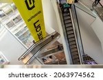 Small photo of Groningen, The Netherlands - Oktober 9, 2021: Interior of the newly build modern contemporary Forum Groningen building with flights of staircases going back and forth between floors