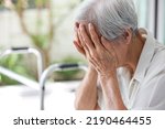 Small photo of Depressed asian senior woman with depression,anxiety,depressive illness,tired old elderly patient crying alone at home,debilitating of disease,emotional problems,mood (affective)disorder,mental health