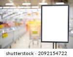 Small photo of Mockup advertising board in front of supermarket Blank price list board Mock up billboard for your text messege or mock up supermarket