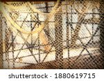 Small photo of Fish Net Vintage Background. Fishing Net Abstract Texture With Knotted Pattern. Old Fishnet Wallpaper. Design Element With Retro Fish Net. Fishnet And Iron Framing Abstract Grunge Design Detail.