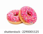 Appetizing donuts with bright pink icing and colorful topping. Sweets and delicious fast food. Isolated on a white background. Close-up.