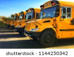 Row of yellow school buses...