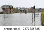 Small photo of Flooded streets and houses in a Danish city under violent autumn storm surge
