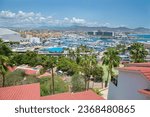Small photo of Cabo San Lucas BCS Mexico Aug 15 2023 Areal view of the city and thye Marina on summer vacations season , tourism at this time of years increases as we can see in the Yachts affluence in the marina