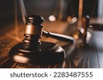 Law theme, gavel or mallet of the judge, lawyer enforcement officers, evidence-based cases taken into account in the court abount business, legislation.