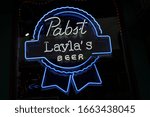 Small photo of Nashville Tenn. February 15, 2020 Broadway nightlife district in downtown Nashville with a vast selection of bars, pubs, and restaraunts. Pabst Beer neon sign at Layla's Bar and Grill.