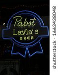 Small photo of Nashville Tenn. February 15, 2020 Broadway nightlife district in downtown Nashville with a vast selection of bars, pubs, and restaraunts. Pabst Beer neon sign at Layla's Bar and Grill.