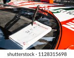 Small photo of MODENA, ITALY - June, 2018. A road book in the cockpit of a Lancia Stratos