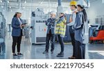 Small photo of Factory Meeting: Black Female Chief Engineer Talking to Colleagues Before Work Day in Heavy Industry Manufacturing Facility. Diverse Group of Employees Listening to Manager.