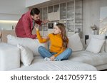 Small photo of Aggressive despotic husband threatening helpless scared wife. Abused unhappy woman fighting against furious man, trying to stop hand. Conflict of male tyrant and female victim, domestic violence