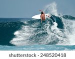A Surfer Carves A Radical Off...